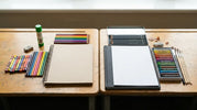 Primary and high school art supplies arranged side by side