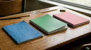  Stapled spiral and wiro-bound school notebooks compared
